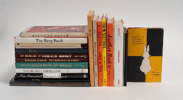 Group of 20 hardbound books about magic tricks.: [Magic Books] Group of 20 hardbound books about magic tricks. Including The Berg Book (1984), Collected Writings of Glen Gravatt (n.d.), The Essential Stewart James (2007; signed and inscribed), For M