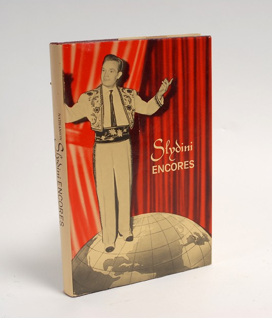 Nathanson, Leon. Slydini Encores. New York, 1966: Nathanson, Leon. Slydini Encores. New York, 1966. Publisher's pebbled maroon cloth, illustrated with photographs. 8vo. Good condition. Signed and inscribed, "To my good friend Herb Zarrow…" by Slydi