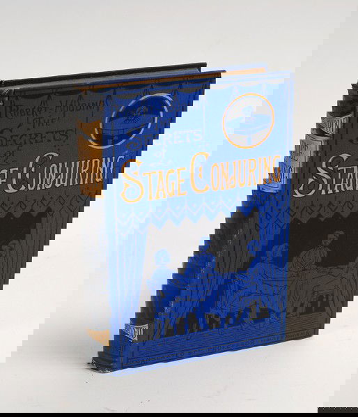 Robert-Houdin, Jean Eugéne. The Secrets of Stage C: Robert-Houdin, Jean Eugéne. The Secrets of Stage Conjuring. London, 1881. Revised edition. Publisher's bright blue pictorial cloth, stamped in gold and black. Portrait frontispiece, illustrated. 8vo.