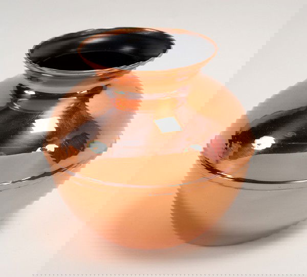 Lota Bowl. New Haven, Petrie & Lewis, ca. 1939: Lota Bowl. New Haven, Petrie & Lewis, ca. 1939. Handsome copper bowl magically fills with water and is emptied, only to refill itself again. 7" high with an opening 4 ¾" in diameter. Hallmarked. Very