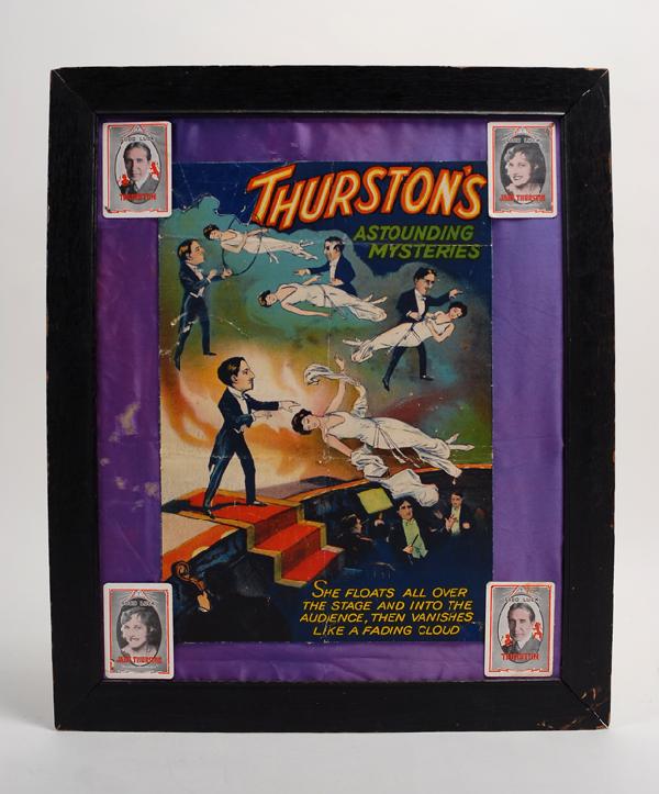 Thurston, Howard. "She Floats" window card collage: Thurston, Howard. "She Floats" window card collage. Most likely Thurston's personal property; crudely framed against purple cloth with four throw out cards of Howard & Jane Thurston affixed to the cor