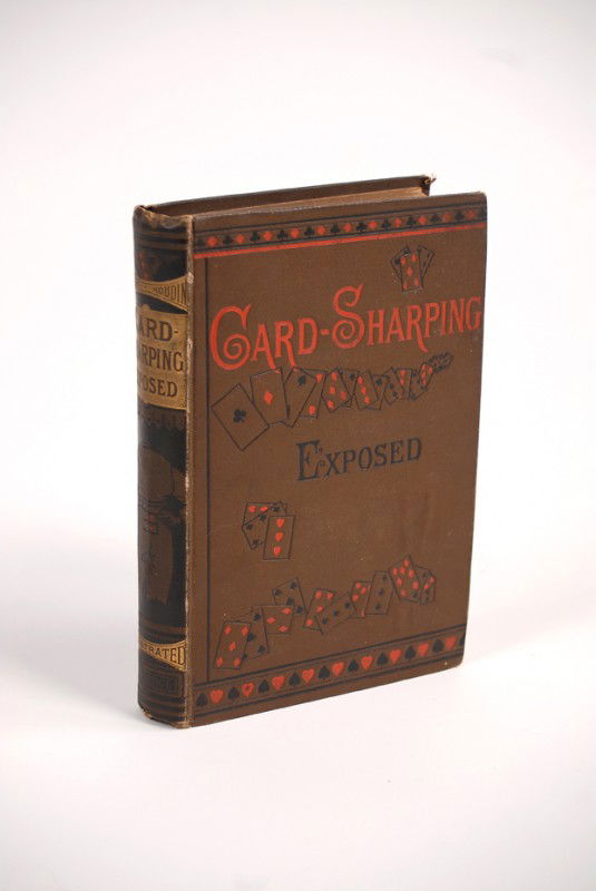 Robert-Houdin, Jean Eugéne. Card Sharping Exposed.1881 : Robert-Houdin, Jean Eugéne. Card Sharping Exposed. London, ca. 1881. Publisher's brown pictorial cloth stamped in red, gold, and black. Illustrated. 8vo. Light wear overall, but a bright example in g