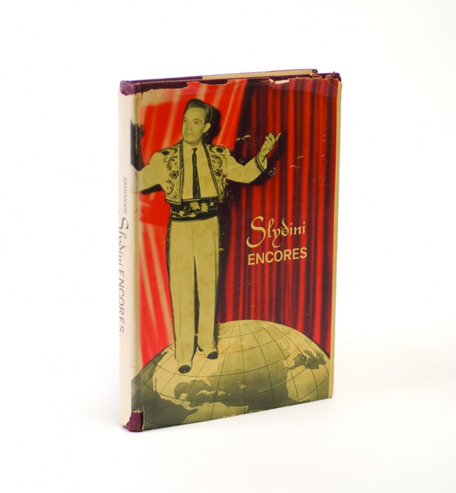 Nathanson, Leon. Slydini Encores. New York, 1966.: Nathanson, Leon. Slydini Encores. New York, 1966. Red cloth with jacket. Illustrated. 8vo. Good condition. Signed and inscribed by Slydini.