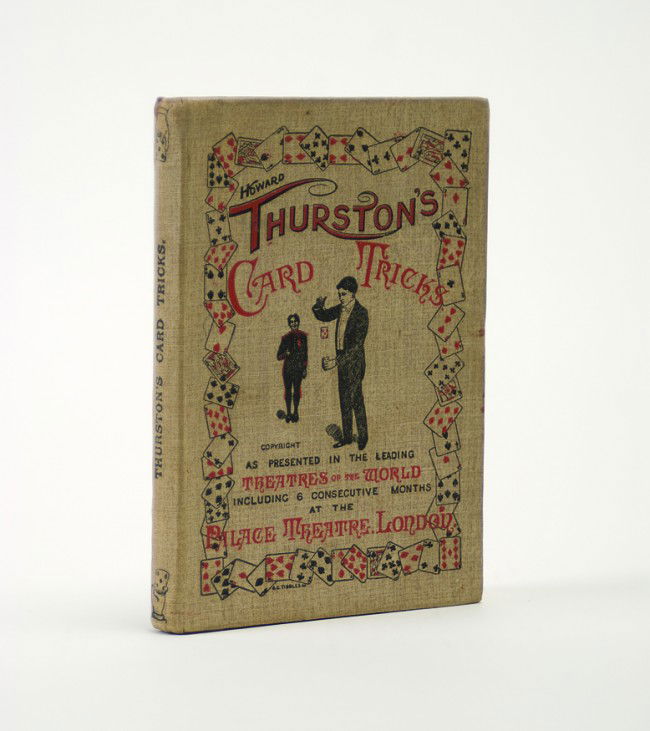 Thurston, Howard. Howard Thurston's Card Tricks 1st ed.: Thurston, Howard. Howard Thurston's Card Tricks. London, 1901. First edition. Pictorial cloth. Illustrated. 8vo. Front hinge paper taped and binding shaken, ex-libris Jack Avis and carrying two of his