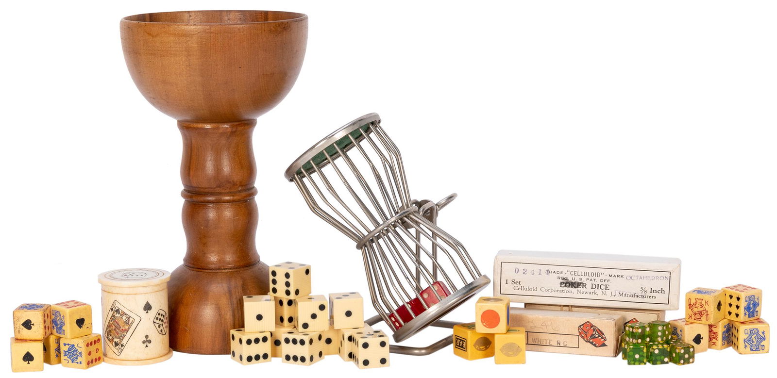 [DICE]. A large group of dice and dice games.: [DICE]. A large group of dice and dice games. Approximately 25 items, including die of multiple varieties, among them poker dice, and related items, including a mini Lowe Chuck A Luck (circa 1940s) an