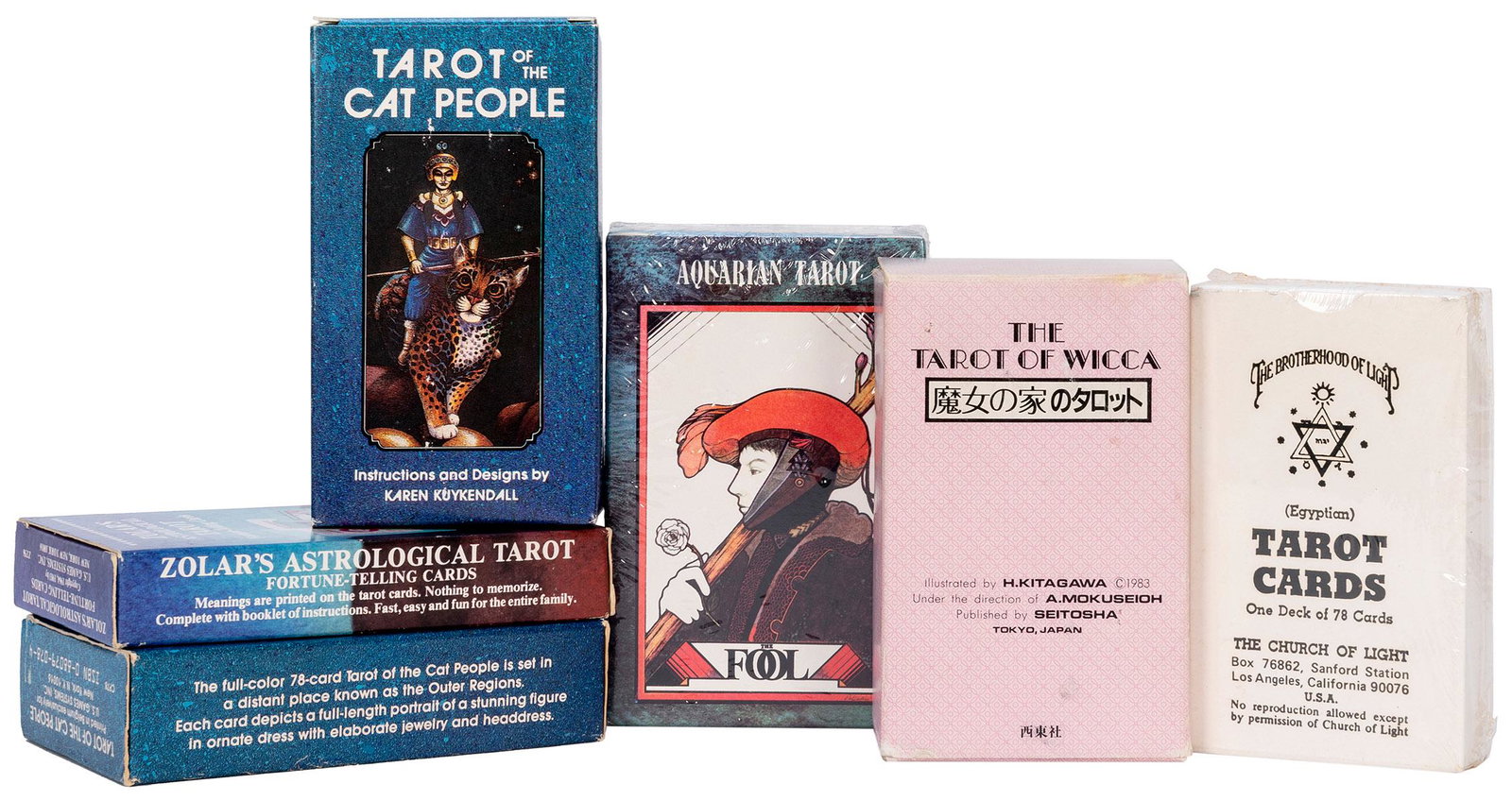 [TAROT AND MYSTICISM]. A group of 6 decks. Includes: [TAROT AND MYSTICISM]. A group of 6 decks. Includes Aquarian Tarot, (1970, Morgan Press, sealed); Egyptian Tarot Cards (1964, The Church of Light); Tarot of the Cat People (1985, U.S. Games Systems, 2