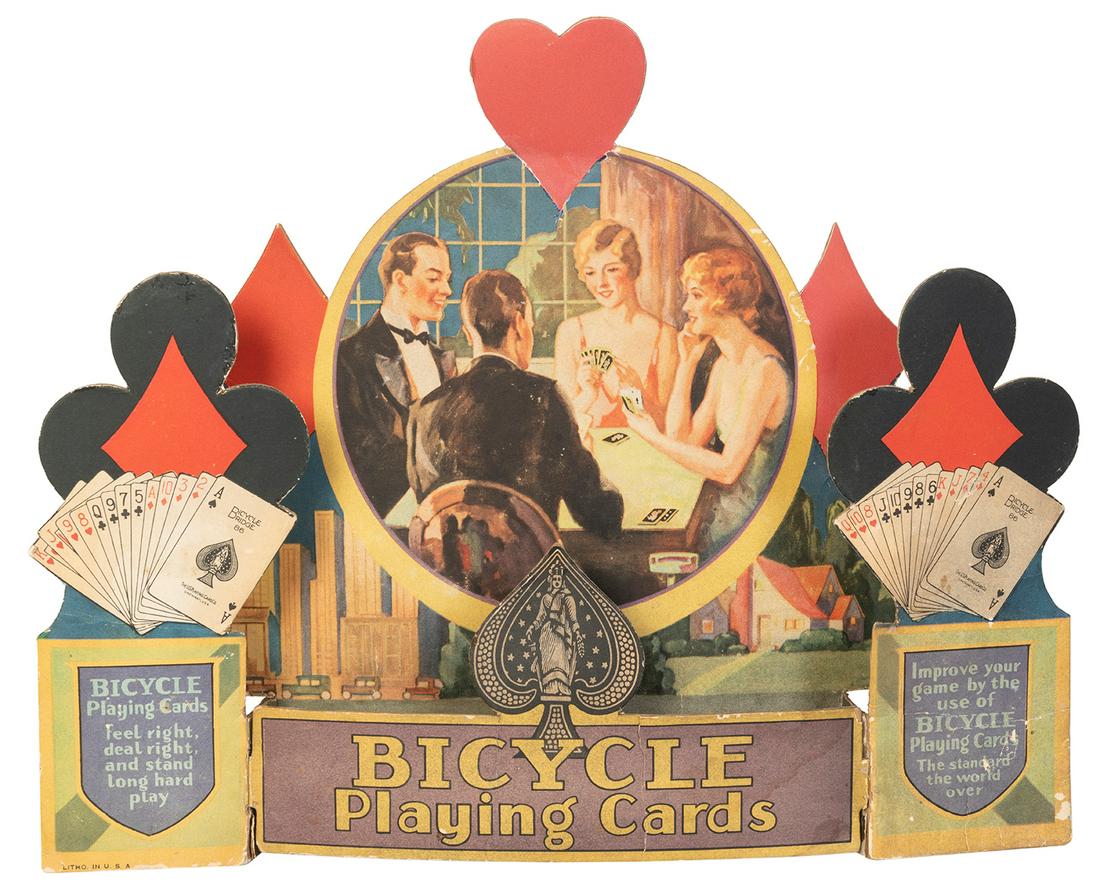 United States Playing Card Co. Bicycle Playing Card: United States Playing Card Co. Bicycle Playing Card Store Counter Display. Circa 1930. Lithographed counter display for Bicycle playing cards featuring a playing card pip motif. Two decks of cards wer