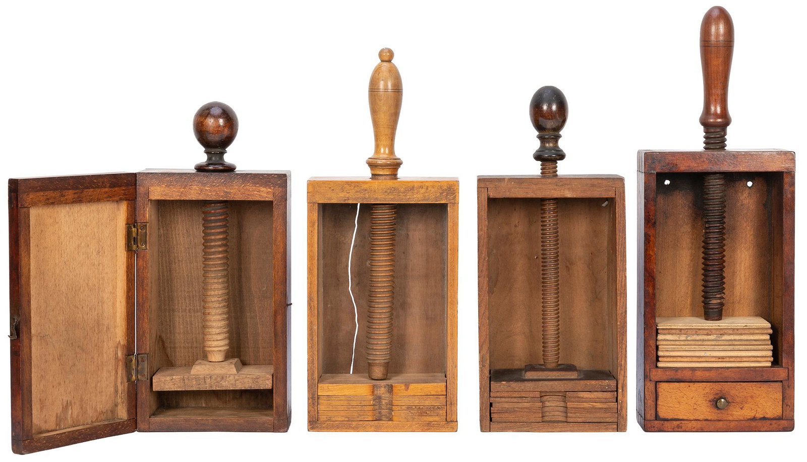 Four Antique Wooden Multi-Deck Card Presses. Circa: Four Antique Wooden Multi-Deck Card Presses. Circa 19th/early 20th century. Each with dovetail joints. With five, six, and seven dividers, the lidded example without dividers, all with a screw-type ha