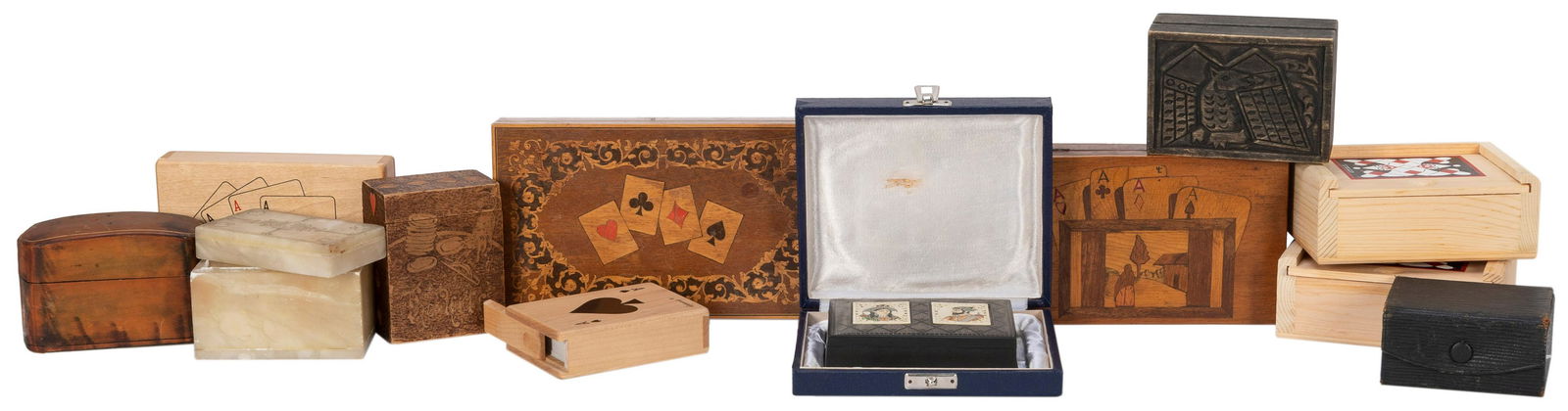 A group of 11 playing card boxes. 20th century. Mix of: A group of 11 playing card boxes. 20th century. Mix of wooden card boxes with playing card motifs on many; includes a marble box and a striking pewter box depicting Shah Jahan, builder of the Taj Maha