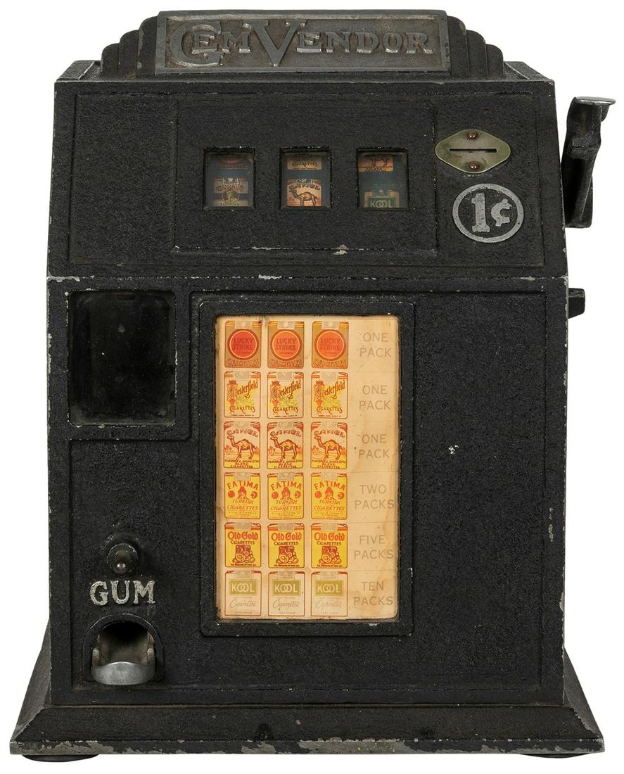 Gem Vendor 1 Cent Trade Stimulator. Circa 1930s. A: Gem Vendor 1 Cent Trade Stimulator. Circa 1930s. A scarce machine that dispenses gumballs or tokens that can be exchanged for packs of cigarettes. 12 x 9 ½ x 9 ½”. Working. Keys includ