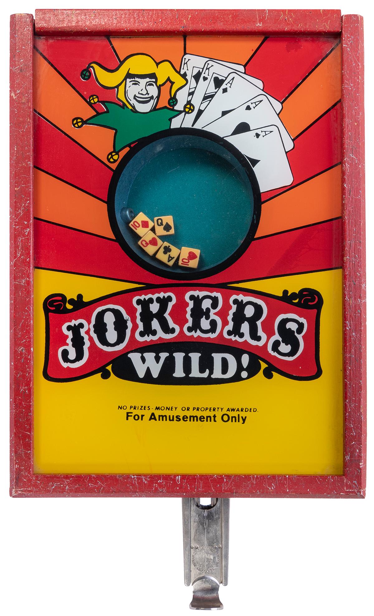 Jokers Wild! 1 Cent Gambling Machine. Macon, GA:: Jokers Wild! 1 Cent Gambling Machine. Macon, GA: Monarch Product Sales Corp., ca. 1970s. 19 ½ x 11 x 7 ½”. Lock and key. Working.