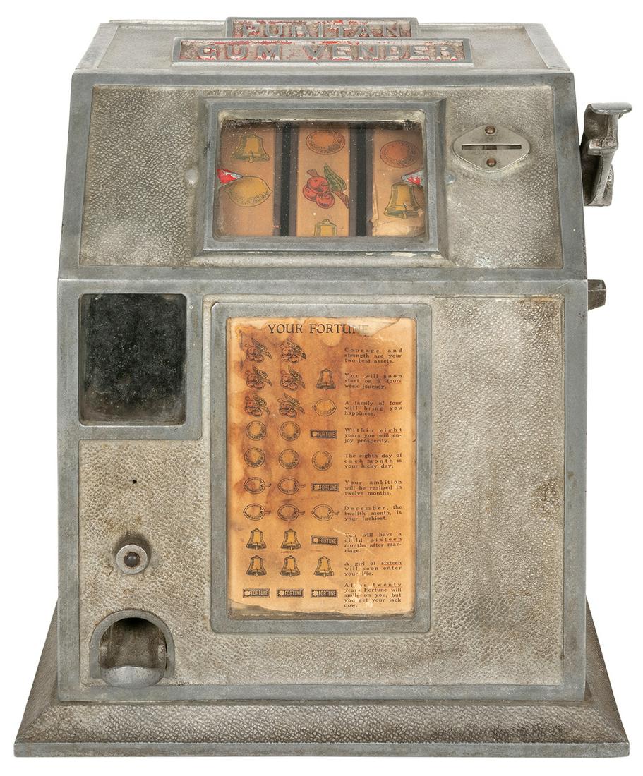 Puritan 1 Cent Trade Stimulator. Circa 1930s.: Puritan 1 Cent Trade Stimulator. Circa 1930s. Three-reel countertop slot machine with fortune teller legend that dispenses a gumball for every winning combination as well as reading one’s fortun