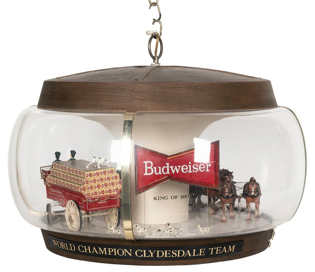 Budweiser Champion Clydesdale Team Hanging Lamp.: Budweiser Champion Clydesdale Team Hanging Lamp. Rotating lamp depicts horses, dalmations, and coach driver. Height, 15”; diam. 23”. Not tested.