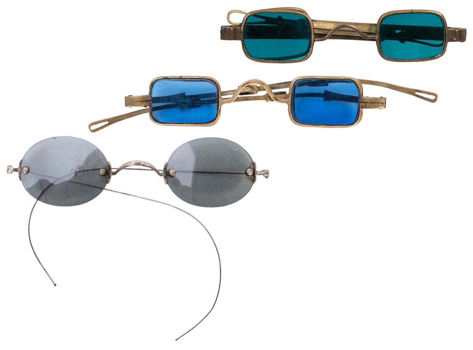 Two Pairs of Antique Double D Lens Spectacles. 19th: Two Pairs of Antique Double D Lens Spectacles. 19th century. One set with blue-tinted lenses, the other with green-blue tinted lenses. One frame marked Schneider Jr. Together with a pair of rimless wi