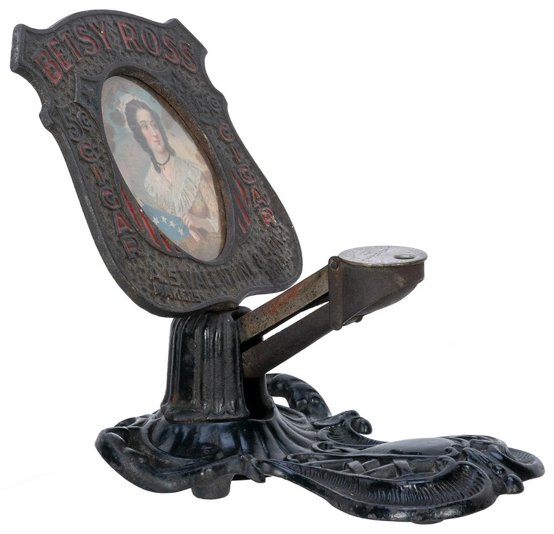 [TOBACCIANA]. Brunhoff Mfg. Co. Betsy Ross Cigar: [TOBACCIANA]. Brunhoff Mfg. Co. Betsy Ross Cigar Cutter. Cincinnati: ca. 1890s. Cast iron cigar cutter with medallion portrait of the famed patriot. 7 ¾ x 6 x 8”. Working.