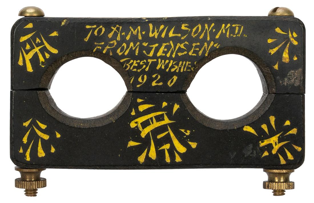 Thumb Cuffs of Sen Yen. 1920. Set of sturdy wooden: Thumb Cuffs of Sen Yen. 1920. Set of sturdy wooden thumb restraints which hold the prisoner’s thumbs tightly by closing them with brass nuts and bolts at the outer ends. Despite the secure natur