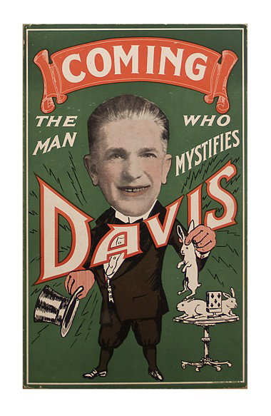 Coming. The Man Who Mystifies. 4 color WC ca1929: Davis, Richard. Coming. The Man Who Mystifies. Davis. Kenton, The Scioto Sign Co., ca. 1929. Four-color window card (14 x 22") depicting a charming caricature of Davis the magician, and oversized phot