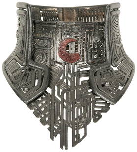 Balem Abrasax Screen-Worn Necklace from Jupiter Ascending. ...: Balem Abrasax Screen-Worn Necklace from Jupiter Ascending. Original screen-used resin necklace prop painted in silver and worn by the villainous Balem Abrasax (Eddie Redmayne), Emperor of the House