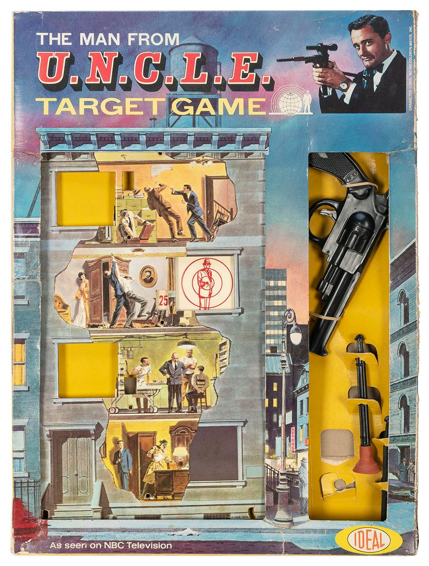 The Man from U.N.C.L.E. Target Game, Shooting Arcade, and P...: The Man from U.N.C.L.E. Target Game, Shooting Arcade, and Pinball Game. Three toys, including The Man from U.N.C.L.E. Target Game (Ideal, 1965) in original box, with gun, lacking one dart; The Man fro
