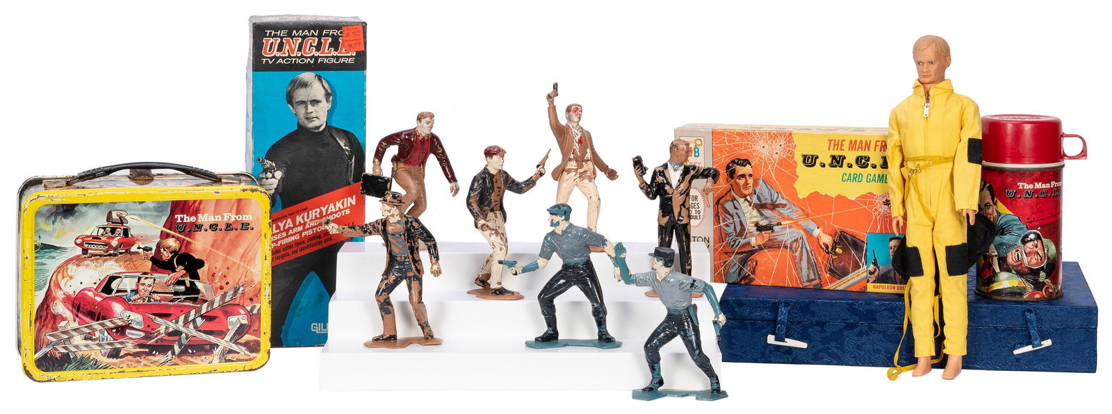 The Man from U.N.C.L.E. Action Figure and Vintage Toy Colle...: The Man from U.N.C.L.E. Action Figure and Vintage Toy Collection. 1960s. Lot includes two Gilbert Illya Kuryakin action figures, one in original box, with a variety of accessories; a King-Seeley lunch