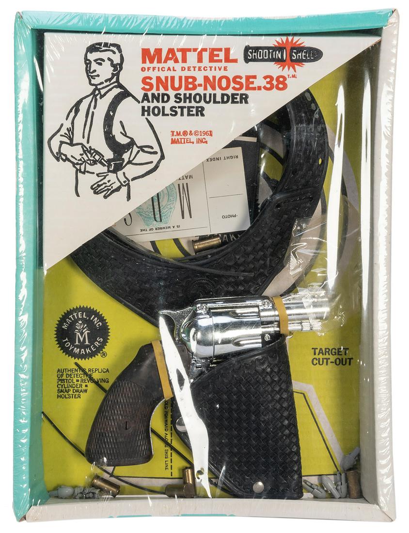 Mattel Detective Snub Nose .38 and Shoulder Holster Set. Ma...: Mattel Detective Snub Nose .38 and Shoulder Holster Set. Mattel, 1961. Official detective snub-nose “shootin’ shell” cap gun in original cardboard box with holster, and ID/wallet. SE