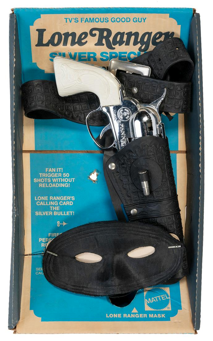 Mattel Lone Ranger Smoking Silver Special Holster Set. Matt...: Mattel Lone Ranger Smoking Silver Special Holster Set. Mattel, 1965. Fanner-50 “silver special” cap pistol in embossed Lone Ranger holster, together with Lone Ranger mask, in original blac