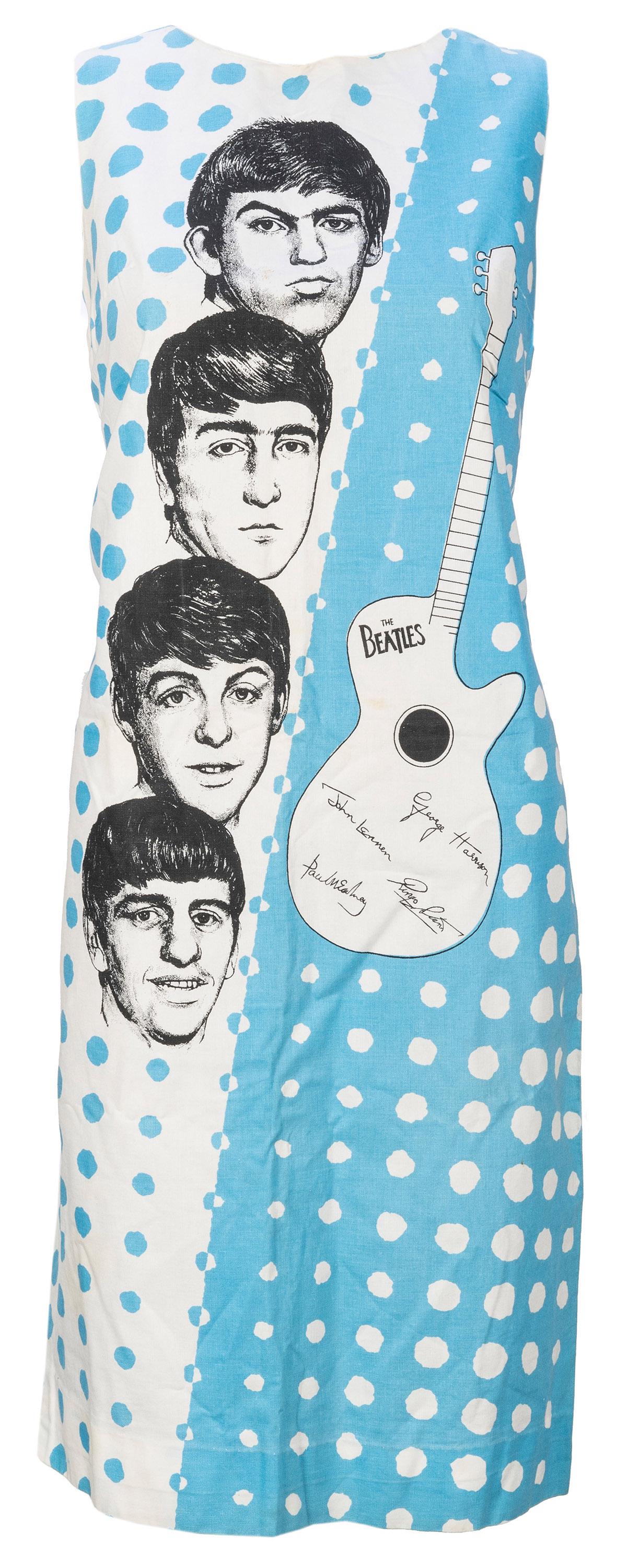 [THE BEATLES]. Beatle Dress. Enschede, Netherlands: Manufac...: [THE BEATLES]. Beatle Dress. Enschede, Netherlands: Manufactured under license by N.V. Stoomweverlj Nivjerheld, 1960s. Original size 40 cotton dress depicting all four Beatles alongside facsimile sign