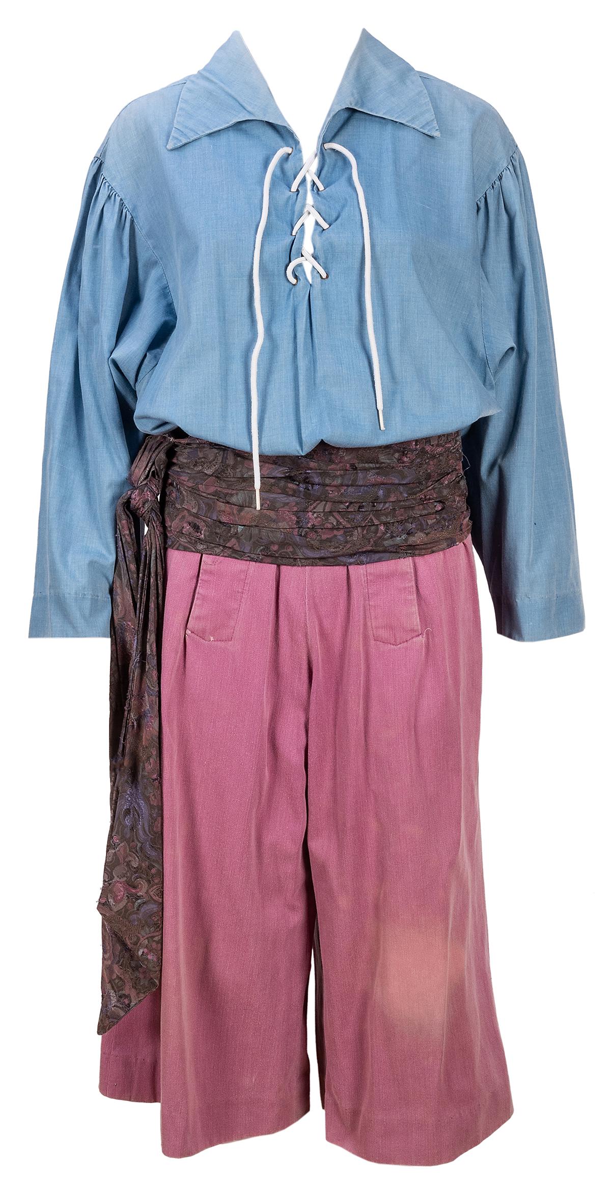 Pirates of the Caribbean Cast Member Costume from Disneylan...: Pirates of the Caribbean Cast Member Costume from Disneyland. Circa 1980s. One-piece costume from Disneyland’s Pirates of the Caribbean ride with sash and a pair of striped socks as worn by Disn