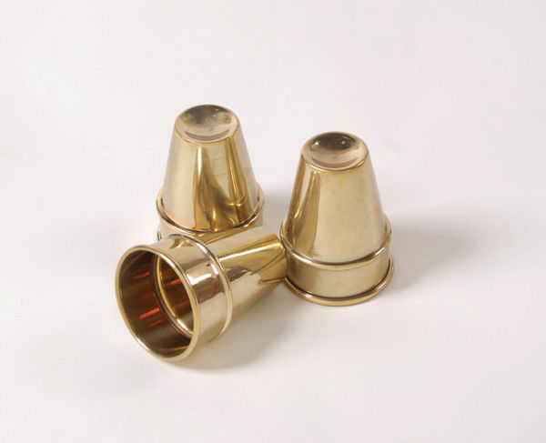 Johnny Paul Cups and Balls. Stevens Magic Emporium: Johnny Paul Cups and Balls. Wichita, Stevens Magic Emporium, ca. 2004. Set of three brass cups modeled after the cups used by famous Chicago/Las Vegas bar magician Johnny Paul. Cup opening measures 2