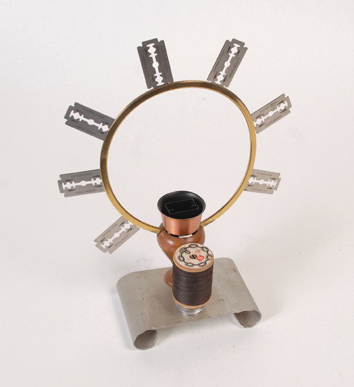Razor Blade trick. Merv Taylor, ca. 1960: Razor Blade trick. North Hollywood, Merv Taylor, ca. 1960. Wooden and metal stand that facilitates the performance of the razor blade swallowing trick. The stand helps the magician switch a prepared p