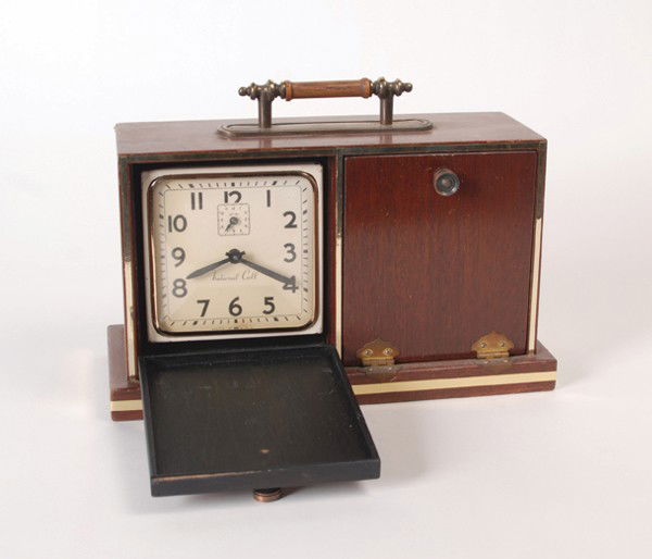 Sliding Clock Box. Owen Magic Supreme, ca. 1960: Sliding Clock Box. Alhambra, Owen Magic Supreme, ca. 1960. An alarm clock is placed into a small mahogany cabinet. Eventually, after considerable by-play with the audience, the magician opens all four