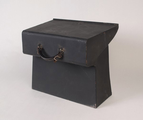 Table & Brief Case. Merv Taylor, ca. 1957: Table & Brief Case. North Hollywood, Merv Taylor, ca. 1957. Compact all-metal (welded steel) briefcase that transforms into a table/working surface. Two aluminum trays fit neatly inside. 18 x 12 x 7".