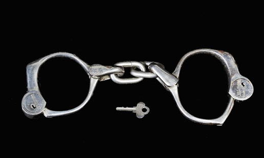 Harry Houdini owned Handcuffs. ca. 1905: Houdini, Harry. Harry Houdini's Bean-Cobb Handcuffs. Worcester, H&R Arms Co., ca. 1905. Pair of sturdy nickel-plated handcuffs with key. The Bean-Cobb was first patented in 1899 and could be locked