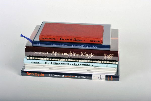 Group of ten books and periodicals about magic tri: [Miscellaneous] Group of ten books and periodicals about magic tricks. Including Approaching Magic by David Regal (2008), The Art of Illusion by John Mulholland (1944), Bob Ostin A Lifetime of Magical