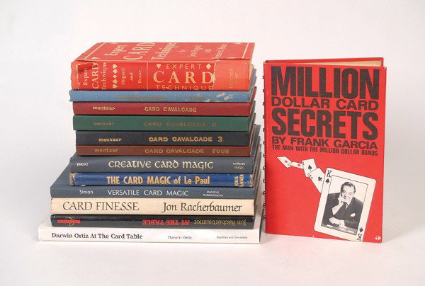 Group of 13 books about card magic.: [Card Magic] Group of 13 books about card magic. Including At the Table by Jon Racherbaumer (1984), Card Cavalcade Vols. 1 – 4 by Jerry Mentzer (1972 – 1977), Card Finesse by Jon Racherbaumer (198