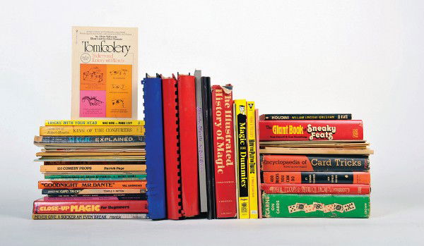 Group of over 60 magic books from the library of T: [Miscellaneous] Group of over 60 magic books from the library of Tom Mullica. Including 400 Tricks You Can Do by Howard Thurston (1948), Don't Look Now by Al Leech (1960), The Encyclopedia of Card Tri