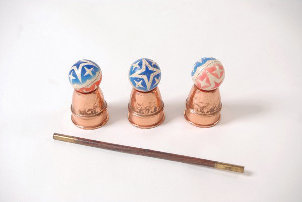 Tom Mullica's Cups and Balls. St. Louis, Rings N' : Tom Mullica's Cups and Balls. St. Louis, Rings N' Things, ca. 1975. Set of three nesting copper cups for the venerable Cups and Balls trick; accompanied by a wooden magic wand with brass tips, three f