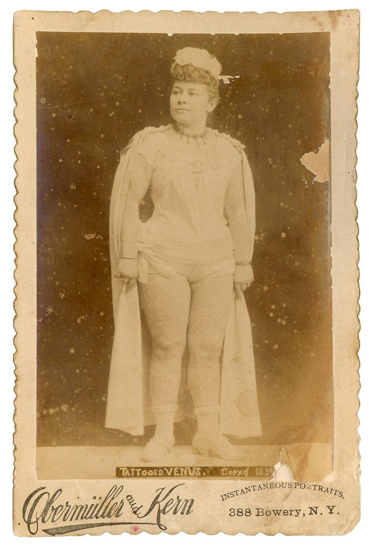 [TATTOO]. Cabinet photograph of Annie Howard, the Tattooed ...: [TATTOO]. Cabinet photograph of Annie Howard, the Tattooed Venus. 1889. New York: Obermuller & Kern. Photograph on printed cabinet mount, titled and copyrighted with date in the negative. 6 3/8 x 4 &#