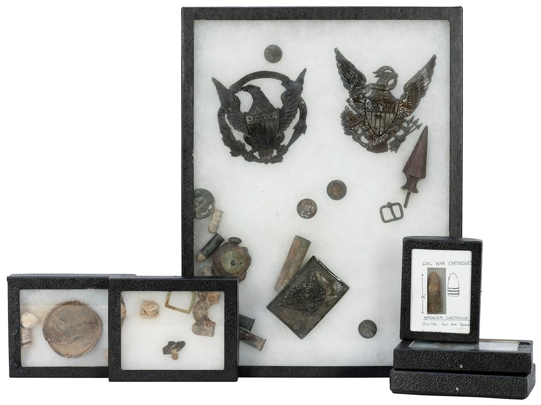 [CIVIL WAR]. A group of nearly 40 relics from the American ...: [CIVIL WAR]. A group of nearly 40 relics from the American Civil War. [V.p., ca. 1861-1865]. Group includes: buttons, buckles medallions, used bullets, cartridges (empty and with old bullets), and a f