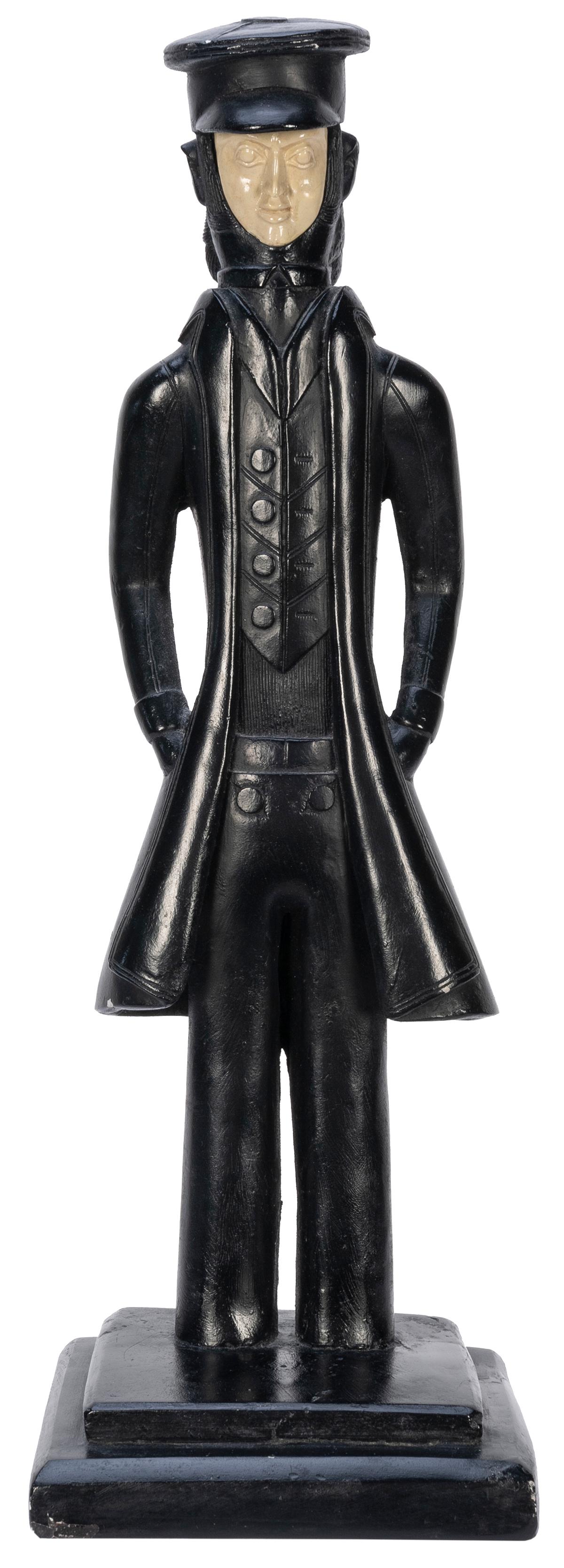 Haida Sea Captain. New York: Museum Pieces, Inc., 1958. Rep...: Haida Sea Captain. New York: Museum Pieces, Inc., 1958. Reproduction figurine from a 19th century original made by the Haida people of the Pacific Northwest depicting a sea captain in top coat and hat