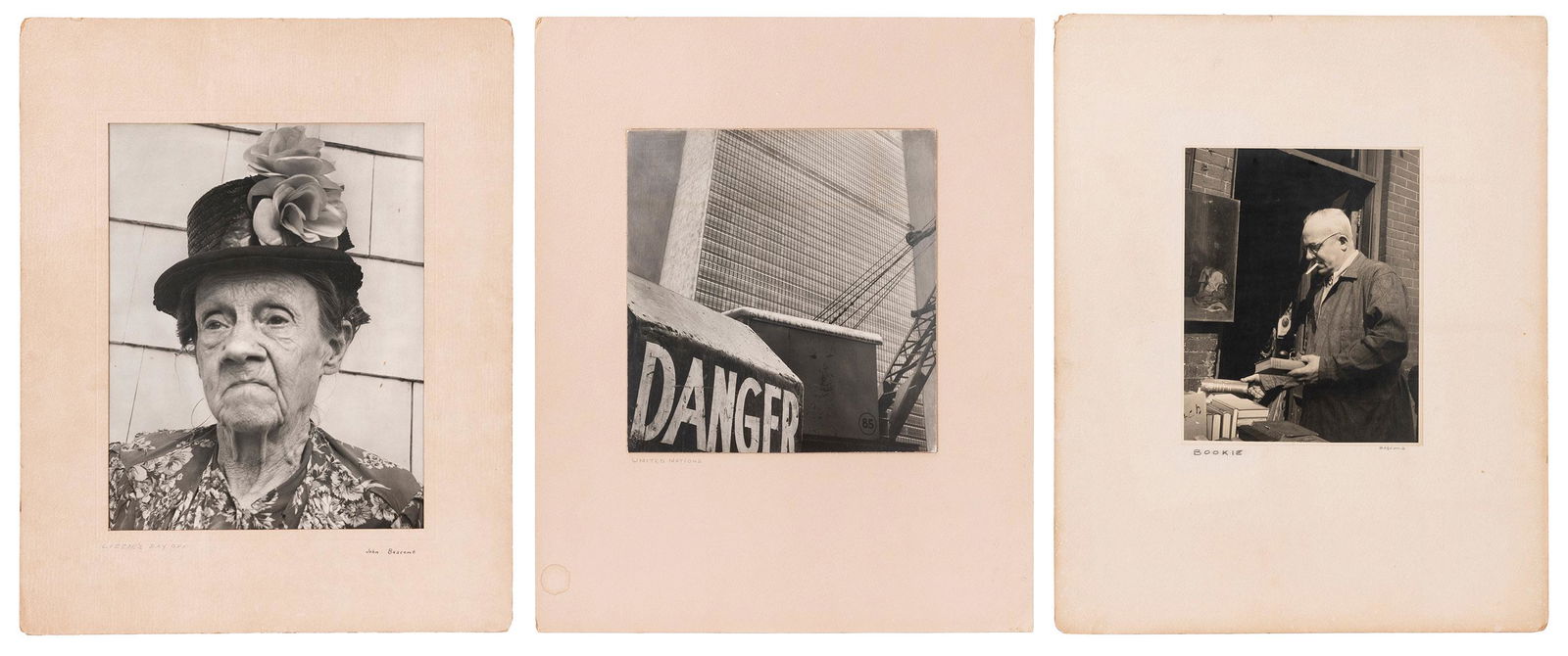 BASCOMB, John (American, no dates available). A group of 3 ...: BASCOMB, John (American, no dates available). A group of 3 original black and white photographs. Circa 1970s. 3 mounted (2 matted) photographs of scenes in New York City. 13 x 10 ¼” and a b