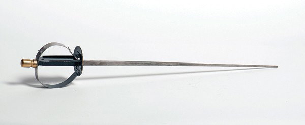 Card Sword. European, ca. 1980 [?]. : Card Sword. European, ca. 1980 [?]. A selected card is speared on the end of a sword when the deck is thrown in the air. Unusual design in that the hilt is hinged in a way to both conceal a card and a