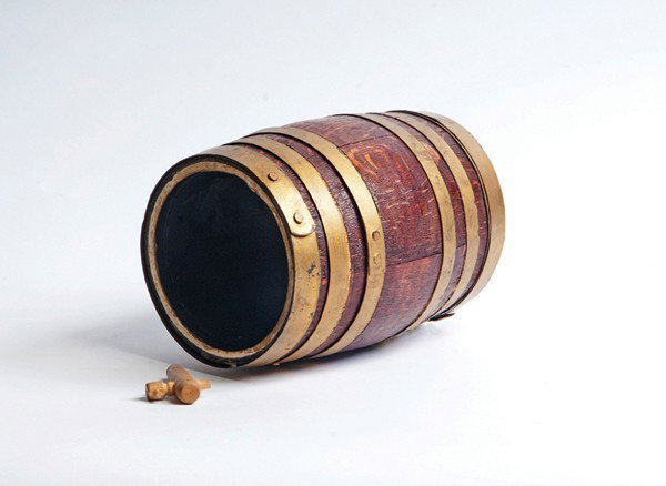 Little Gem Deluxe Beer Keg. U.F. Grant ca 1945: Little Gem Deluxe Beer Keg. Columbus Ohio, U.F. Grant, ca. 1945. The magician shows an empty wooden barrel and caps its ends with paper. He inserts a spigot, then pours a large quantity of drinks from
