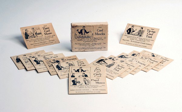 Magic Set] Adams' Card Miracles. Neptune NJ, 1940: Magic Set] Adams' Card Miracles. Neptune New Jersey, S.S. Adams Co., ca. 1940. Group of card tricks employing specially printed cards devised by Theodore DeLand. Each trick is packed in a pictorial en