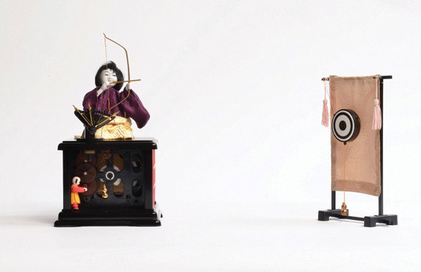 Archer Karakuri mechanical doll/automaton. Tokyo, : Archer Karakuri mechanical doll/automaton. Tokyo, Gakken, Ca. 2004. Designed during the Edo period (1603-1867), the mechanics that make this recreation karakuri doll function are precise and complex. 