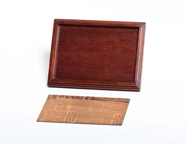 Flap Tray. Los Angeles, F.G. Thayer & Co. ca. 1925: Flap Tray. Los Angeles, F.G. Thayer & Co., ca. 1925. A mahogany tray that allows the magician to switch cards placed on it for a duplicate set. 8 x 6". Good condition.