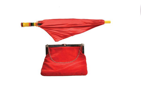 Milady's Parasol. LA, F.G. Thayer, ca. 1930: Milady's Parasol. Los Angeles, F.G. Thayer, ca. 1930. The cover of an attractive sunshade transposes with silk handkerchiefs placed in an attractive velvet handbag. Turned wooden handle accents metal