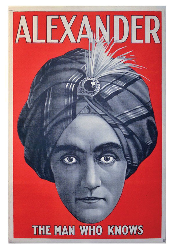 Alexander The Man Who Knows litho poster: Alexander (Claude Alexander Conlin). Alexander the Man Who Knows. [Bombay, Av Yaga, c. 1915]. One-sheet (28 x 40") color lithograph poster depicting Alexander's turbaned head on a red background. Uppe