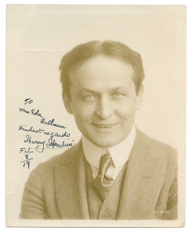 Bust portrait of Harry Houdini. signed/inscribed : Houdini, Harry. Bust portrait of Harry Houdini, inscribed and signed. [New York], 1919. Classic sepia-toned bust portrait of a smiling Houdini in coat, vest and tie at the peak of his powers. 8 x 10".