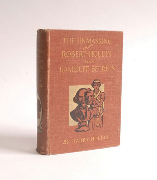 329 : H. Houdini. The Unmasking of Robert-Houdin 1909: Houdini, Harry. The Unmasking of Robert-Houdin and Handcuff Secrets. London, 1909. Publisher's pictorial cloth, illustrated with photographs. Thick 8vo. Spine broken and exterior worn; former owner's